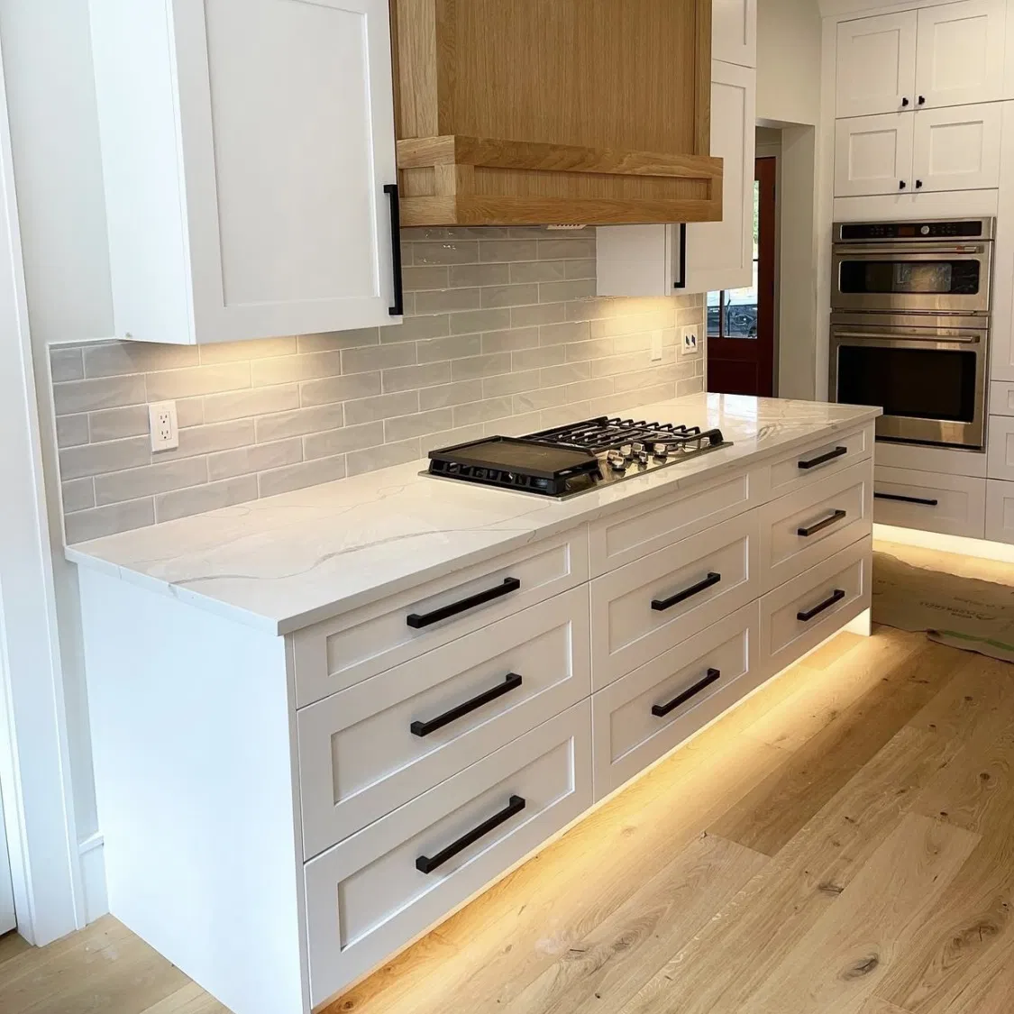 Beautiful kitchen granite countertop with white cabinets